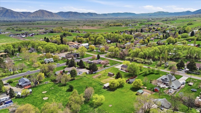 45 West 100 South Mendon, UT 84325 - Photo 54 of 64 Aerial view of residential area featuring mountains