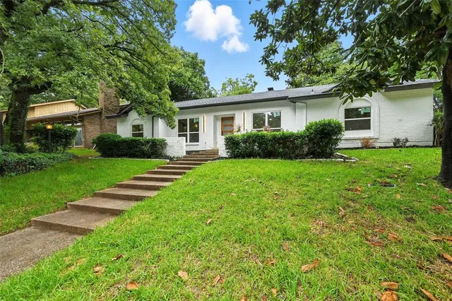 front view of a house and a yard