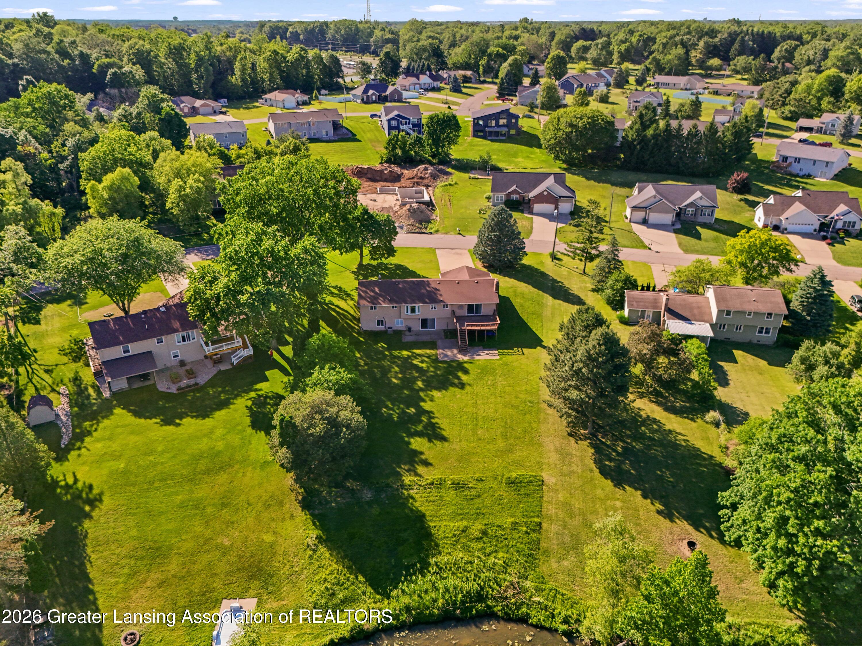 6822 Aberdeen Drive Dimondale, MI 48821 - Photo 13 of 47 DJI_20260612181011_0936_D
