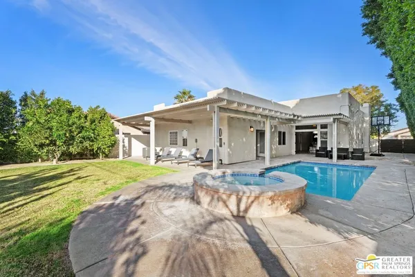 a view of a house with entertaining space