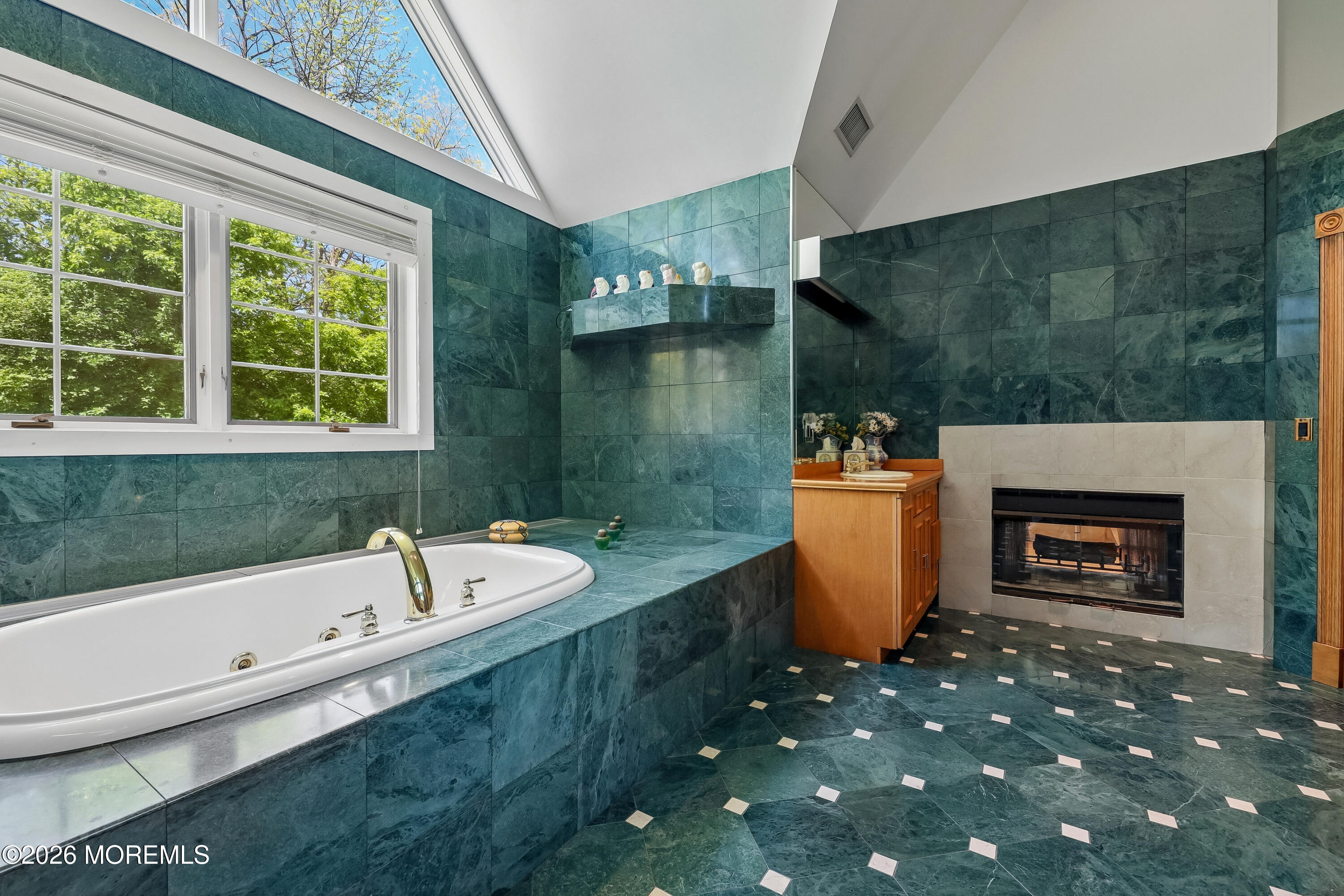 187 Hockhockson Road Colts Neck, NJ 07722 - Photo 34 of 55 a bathroom with a sink a bathtub and a shower