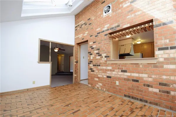 a kitchen with a stove a sink and a refrigerator