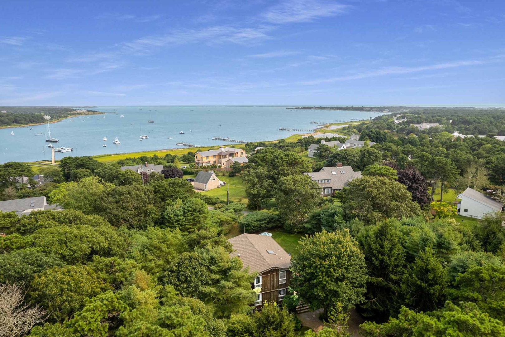 25 Down Harbor Road Edgartown, MA 02539 - Photo 11 of 35 an aerial view of a house with a yard and lake view