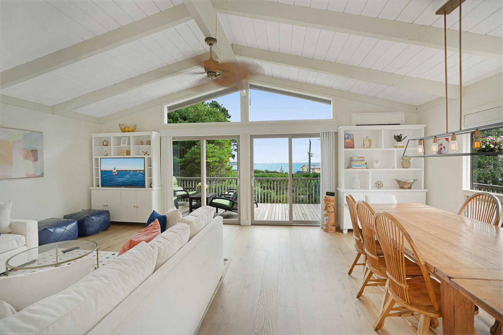 25 Down Harbor Road Edgartown, MA 02539 - Photo 12 of 35 a living room with furniture and a large window