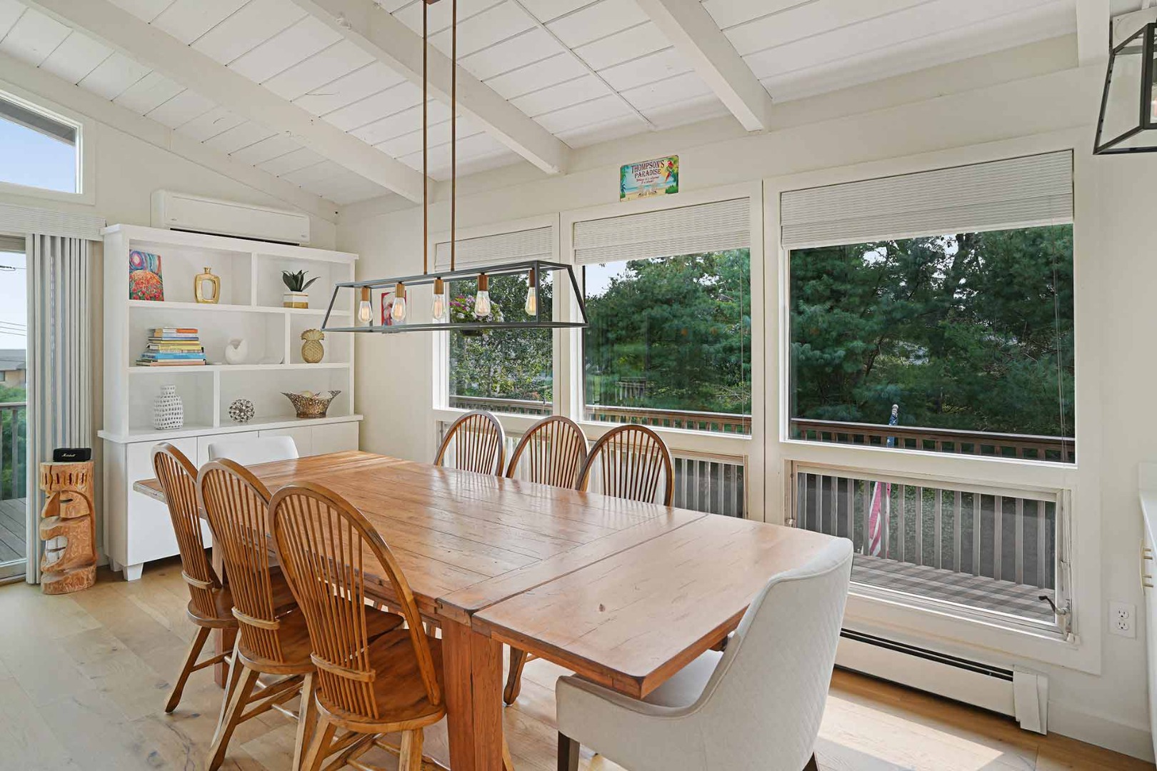 25 Down Harbor Road Edgartown, MA 02539 - Photo 14 of 35 a view of a dining room with furniture window and outside view