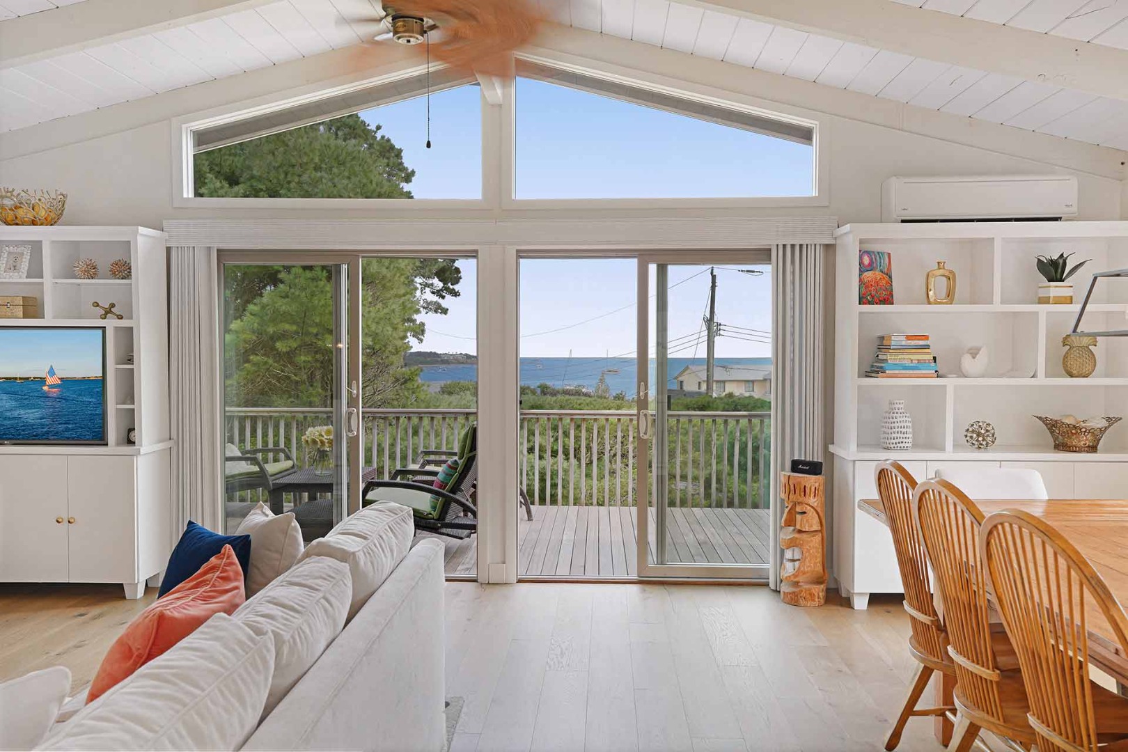 25 Down Harbor Road Edgartown, MA 02539 - Photo 18 of 35 a living room with furniture and a large window