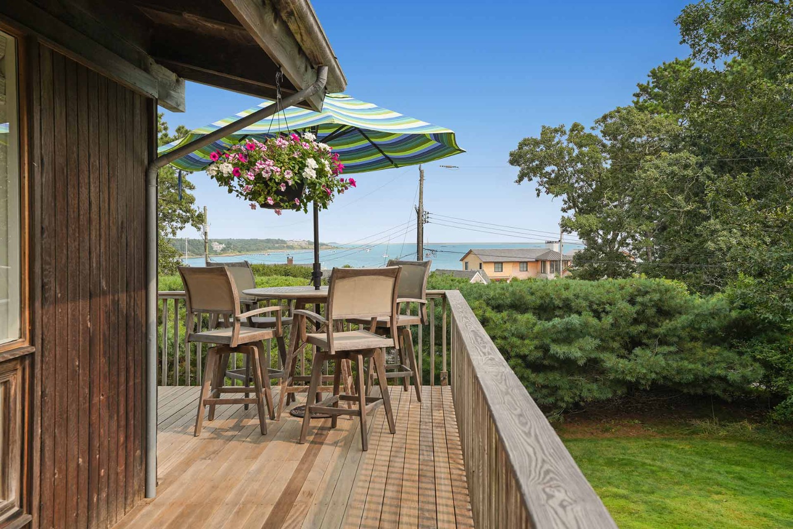 25 Down Harbor Road Edgartown, MA 02539 - Photo 20 of 35 a view of balcony with furniture and outdoor kitchen
