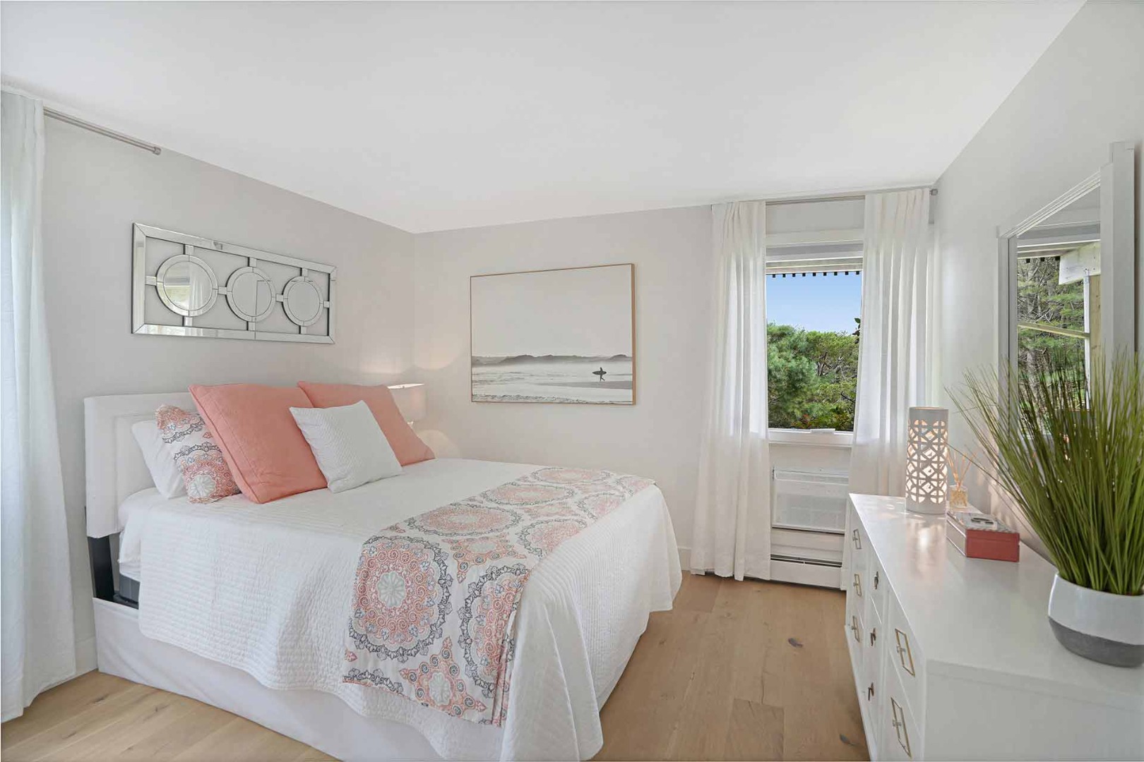 25 Down Harbor Road Edgartown, MA 02539 - Photo 25 of 35 a bedroom with a bed and a potted plant