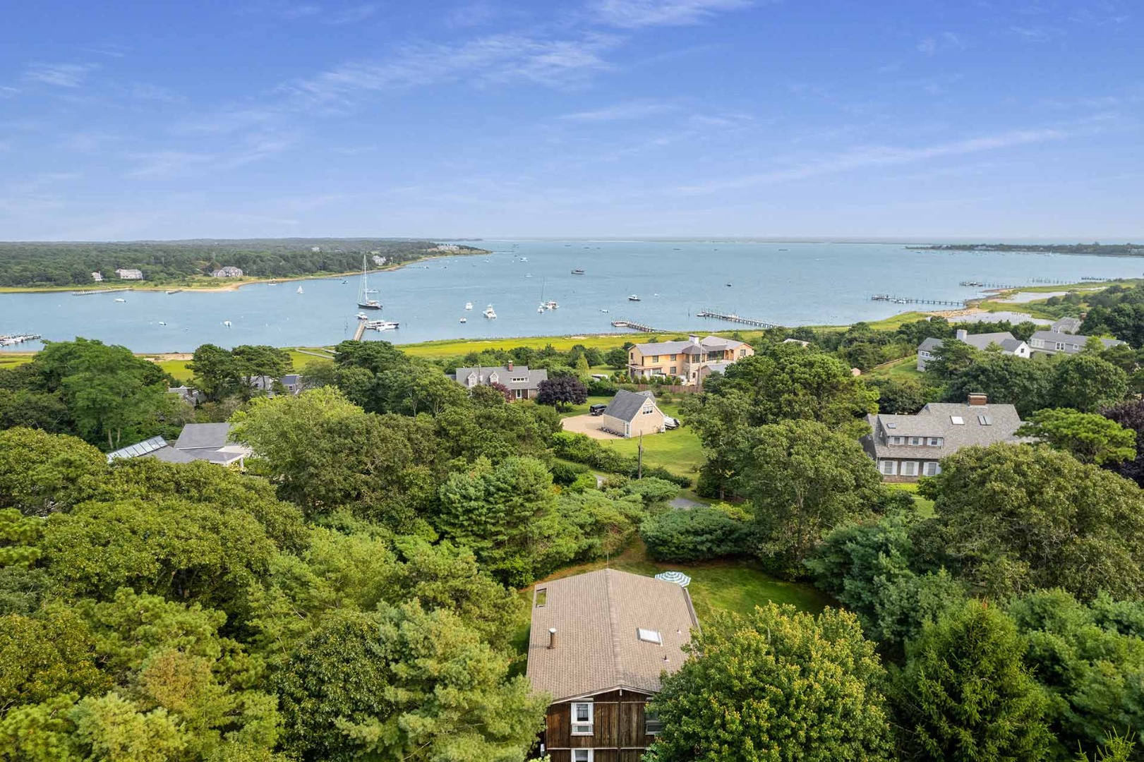 25 Down Harbor Road Edgartown, MA 02539 - Photo 31 of 35 an aerial view of a house with a yard and lake view