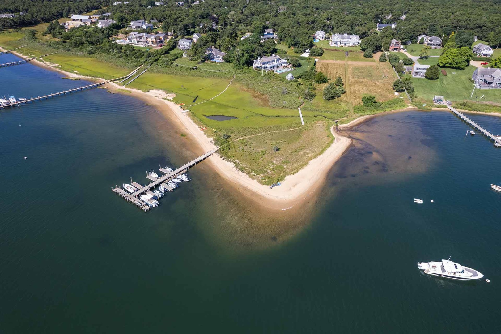 25 Down Harbor Road Edgartown, MA 02539 - Photo 7 of 35 a view of a lake with a house