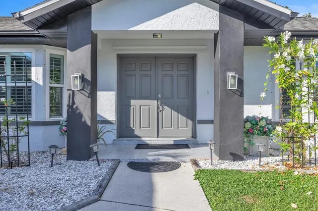 a view of walk in closet with clothes