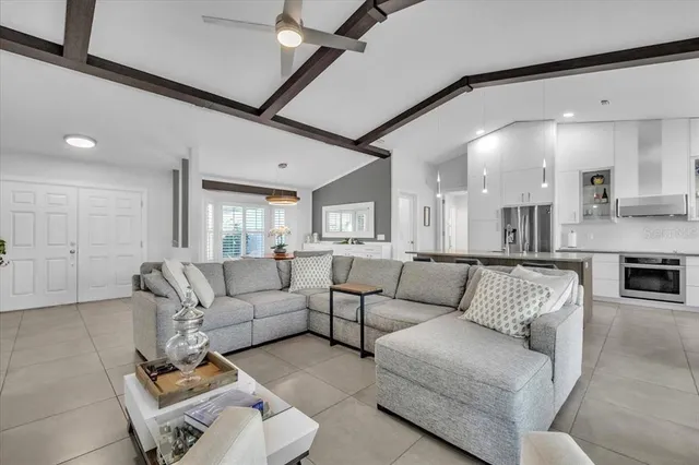 a large white bed in a white room