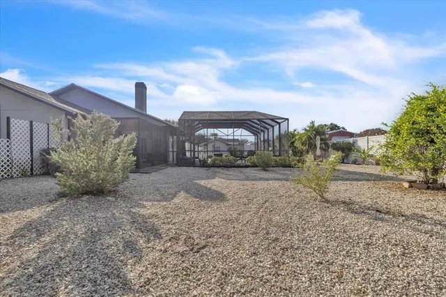 an aerial view of a house with a ocean view