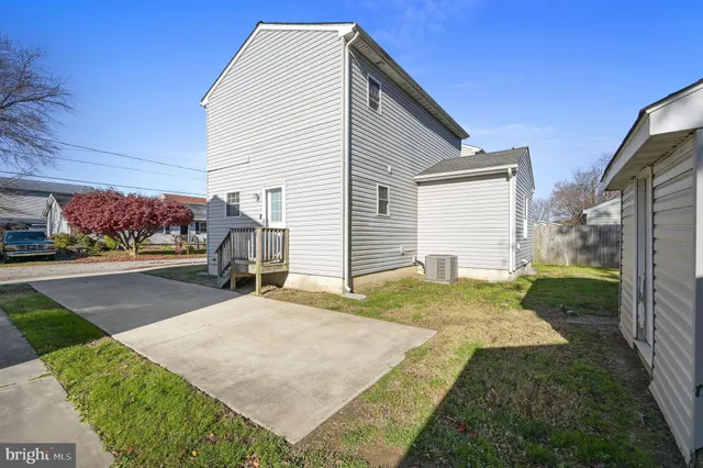 a view of a backyard of the house