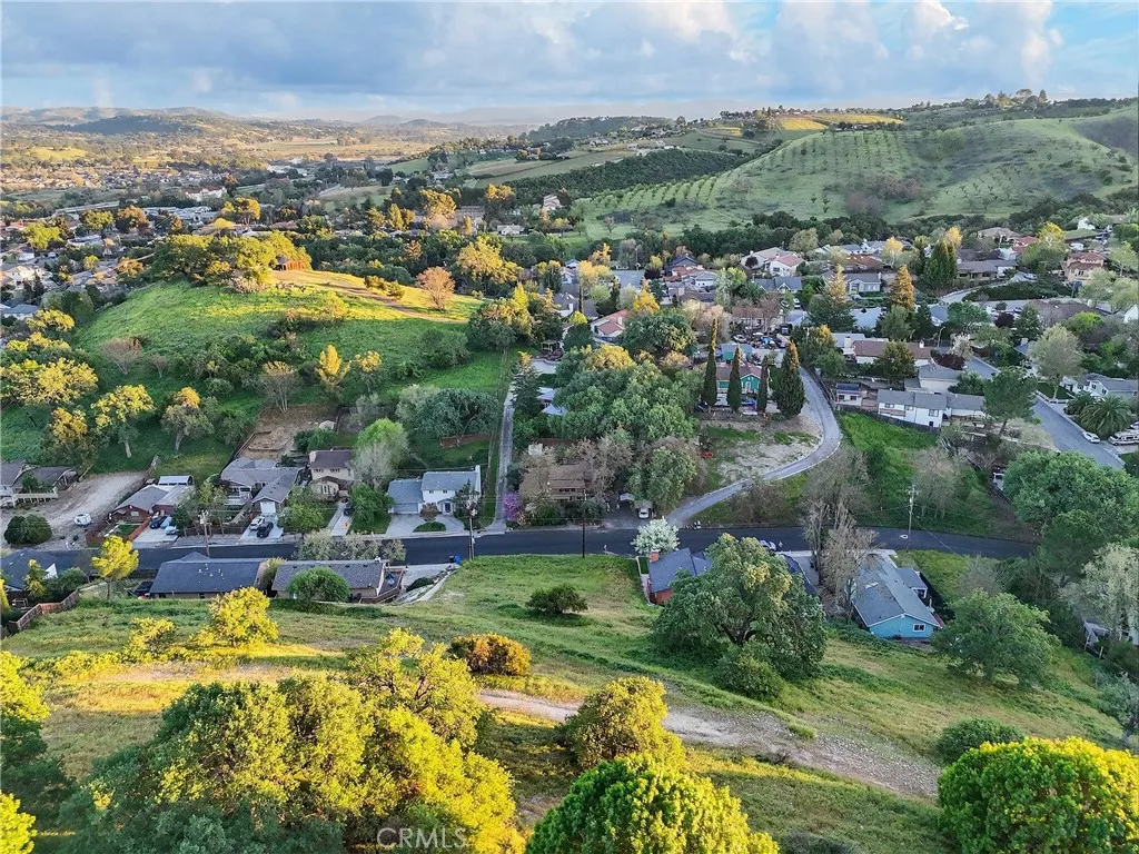 153 Pacific Paso Robles, CA 93446 - Photo 8 of 14 an aerial view of residential houses with outdoor space and swimming pool