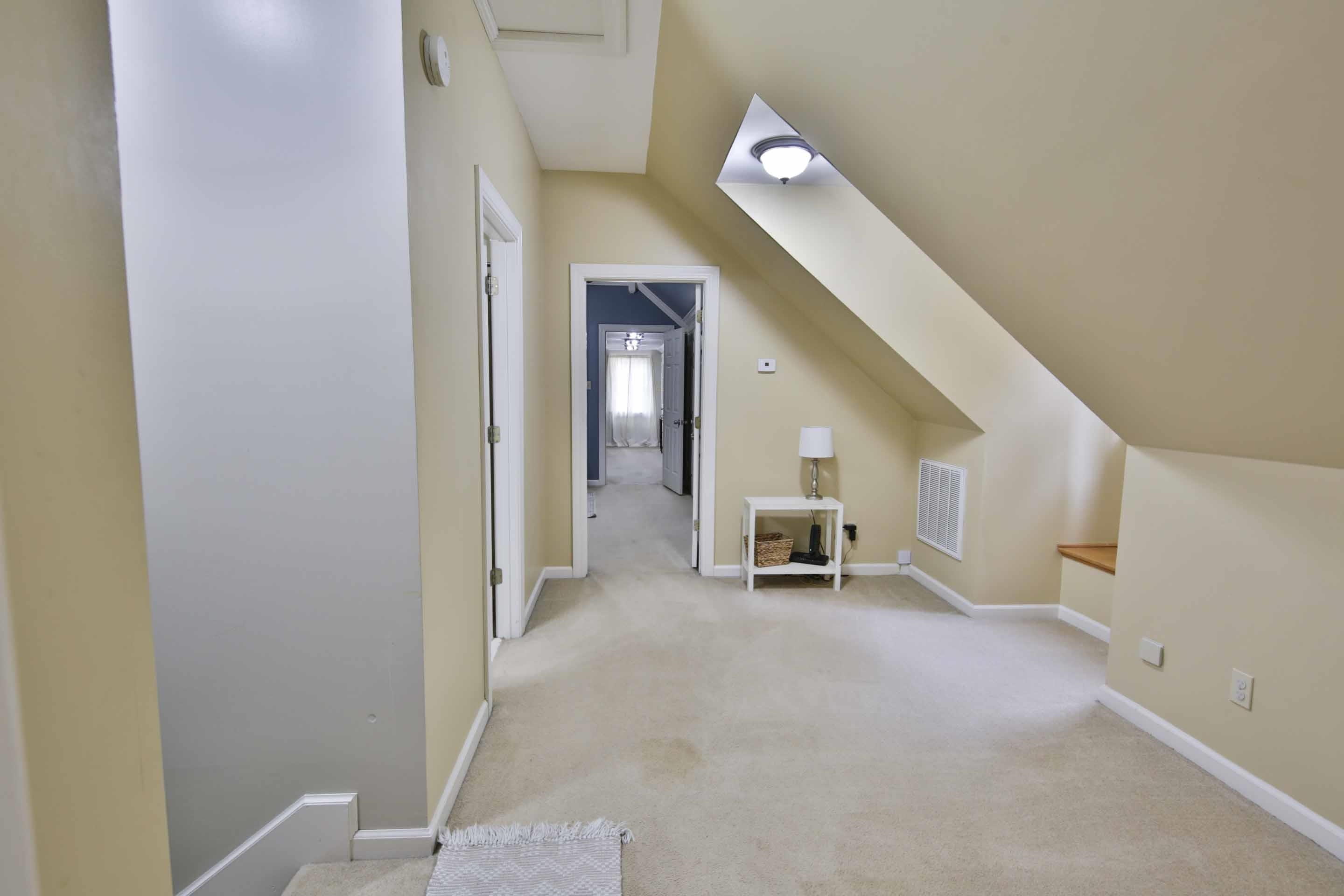 104 Miller Road Covington, TN 38019 - Photo 24 of 25 Carpeted hallway featuring a neutral color palette, recessed lighting, and white trim