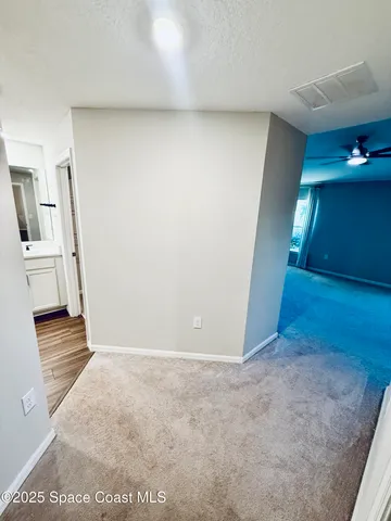 a view of a livingroom with wooden floor