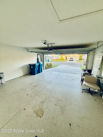 a view of a swimming pool and an outdoor seating