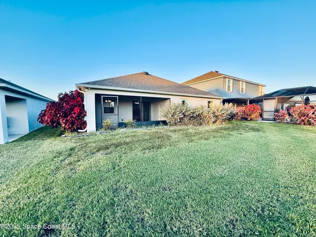 a front view of house with yard