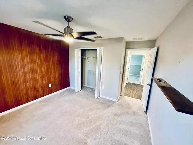 a view of a livingroom with a staircase