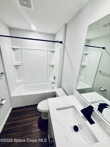 a bathroom with a sink and a toilet