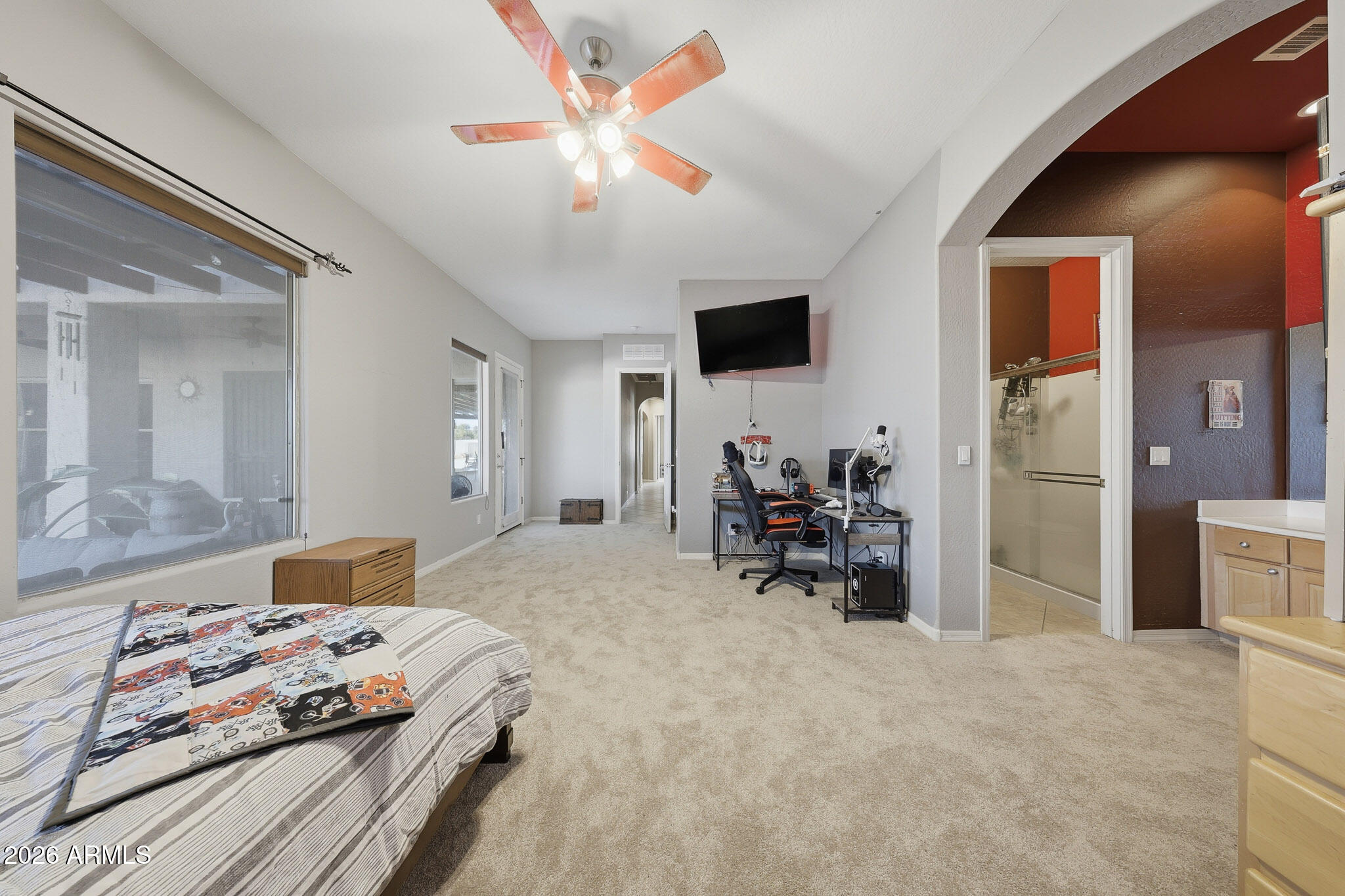 23024 West Sierra Ridge Way Wittmann, AZ 85361 - Photo 19 of 99 a bedroom with furniture and a bed