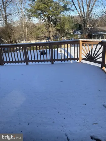 a view of balcony with wooden floor
