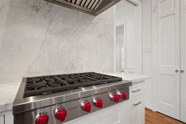 a room with lots of different colored cloths