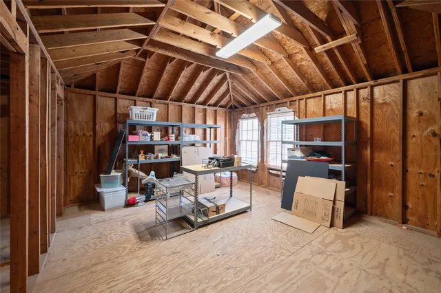a view of a room with furniture