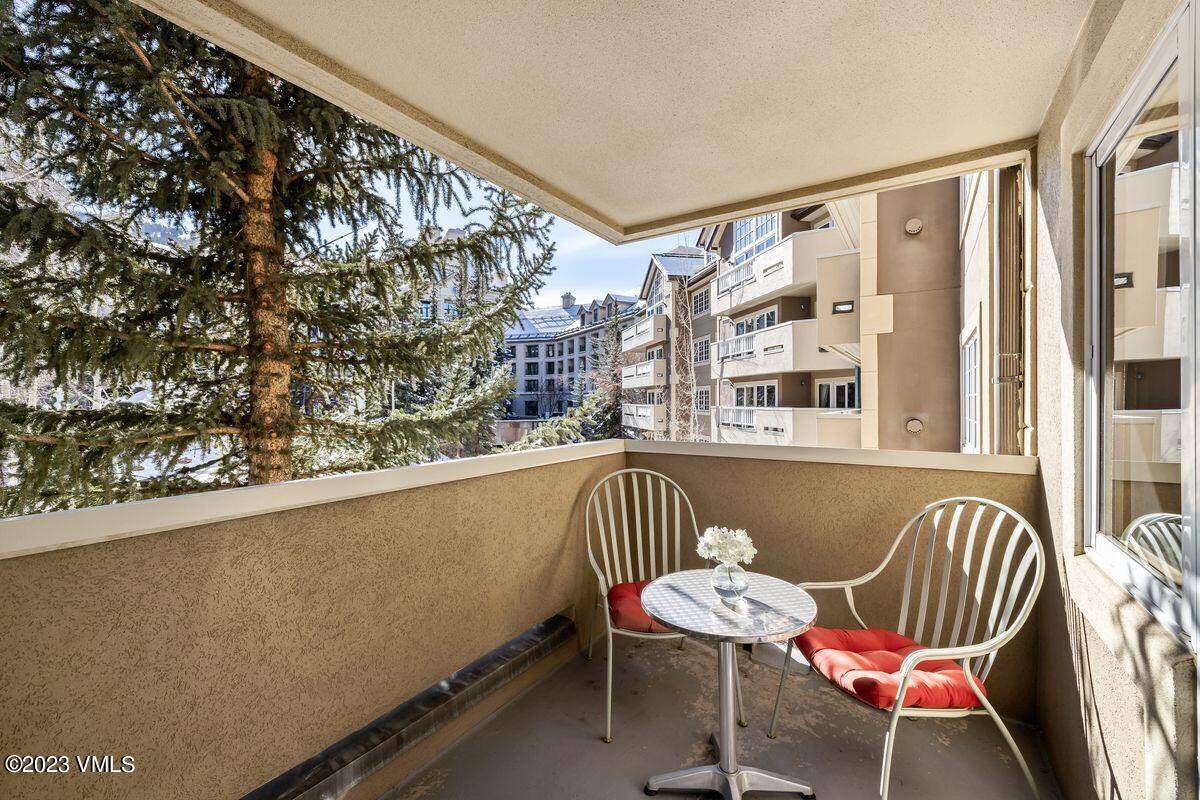 210 Offerson Road, Unit R225 Beaver Creek, CO 81620 - Photo 19 of 42 a view of a chairs and table in a balcony