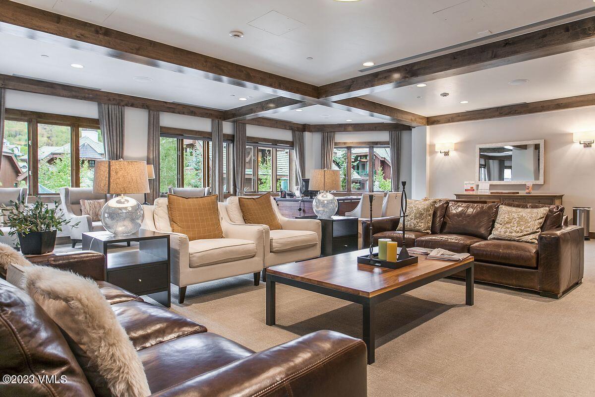 210 Offerson Road, Unit R225 Beaver Creek, CO 81620 - Photo 26 of 42 a living room with furniture and a large window