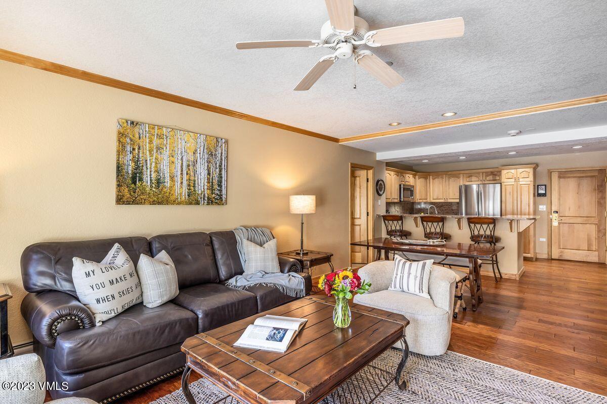 210 Offerson Road, Unit R225 Beaver Creek, CO 81620 - Photo 5 of 42 a living room with furniture and wooden floor