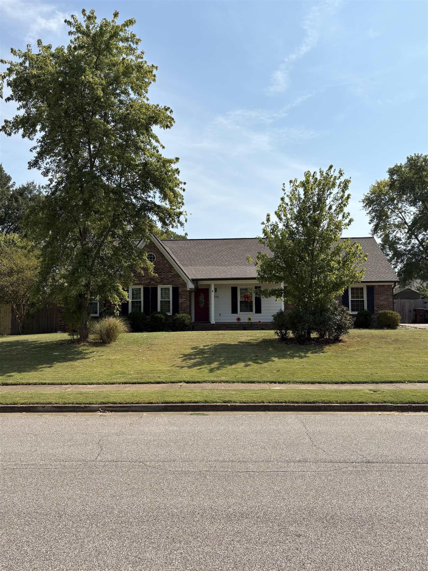 488 Old Collierville Arlington Road Collierville, TN 38017 - Photo 1 of 23 a view of a house with a big yard and large trees