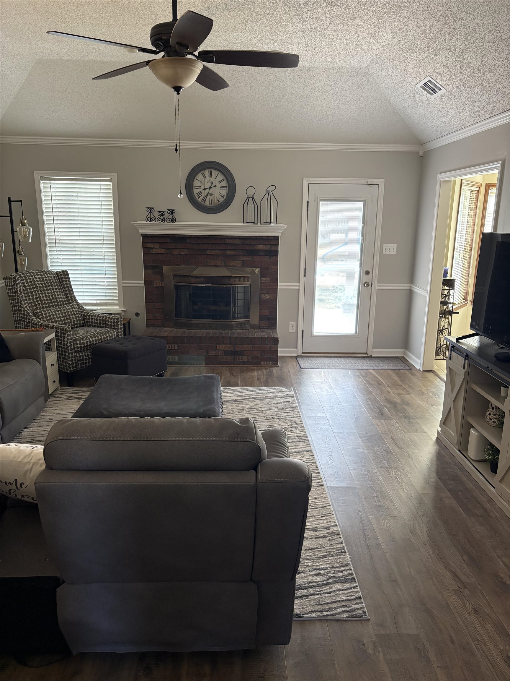 488 Old Collierville Arlington Road Collierville, TN 38017 - Photo 3 of 23 a living room with furniture and a fireplace