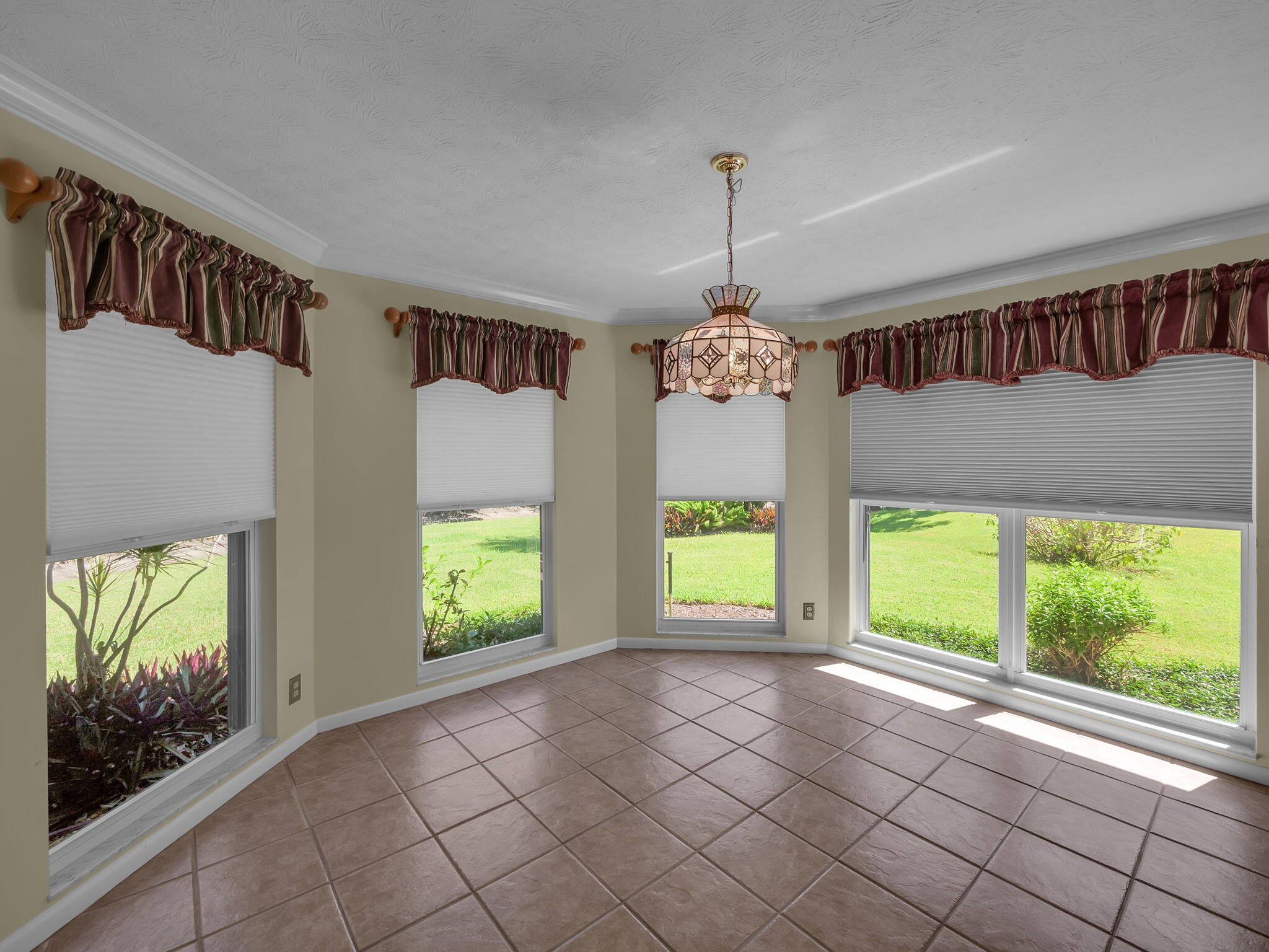 8165 Southeast Cypress Point Place Hobe Sound, FL 33455 - Photo 12 of 46 a view of an entryway with a window