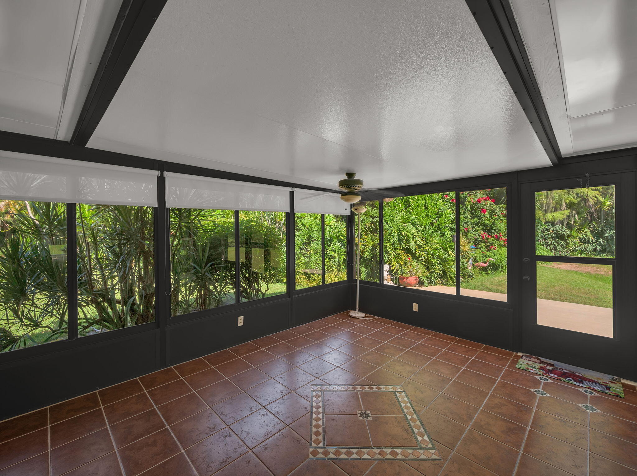 8165 Southeast Cypress Point Place Hobe Sound, FL 33455 - Photo 25 of 46 a view of an empty room with a large window