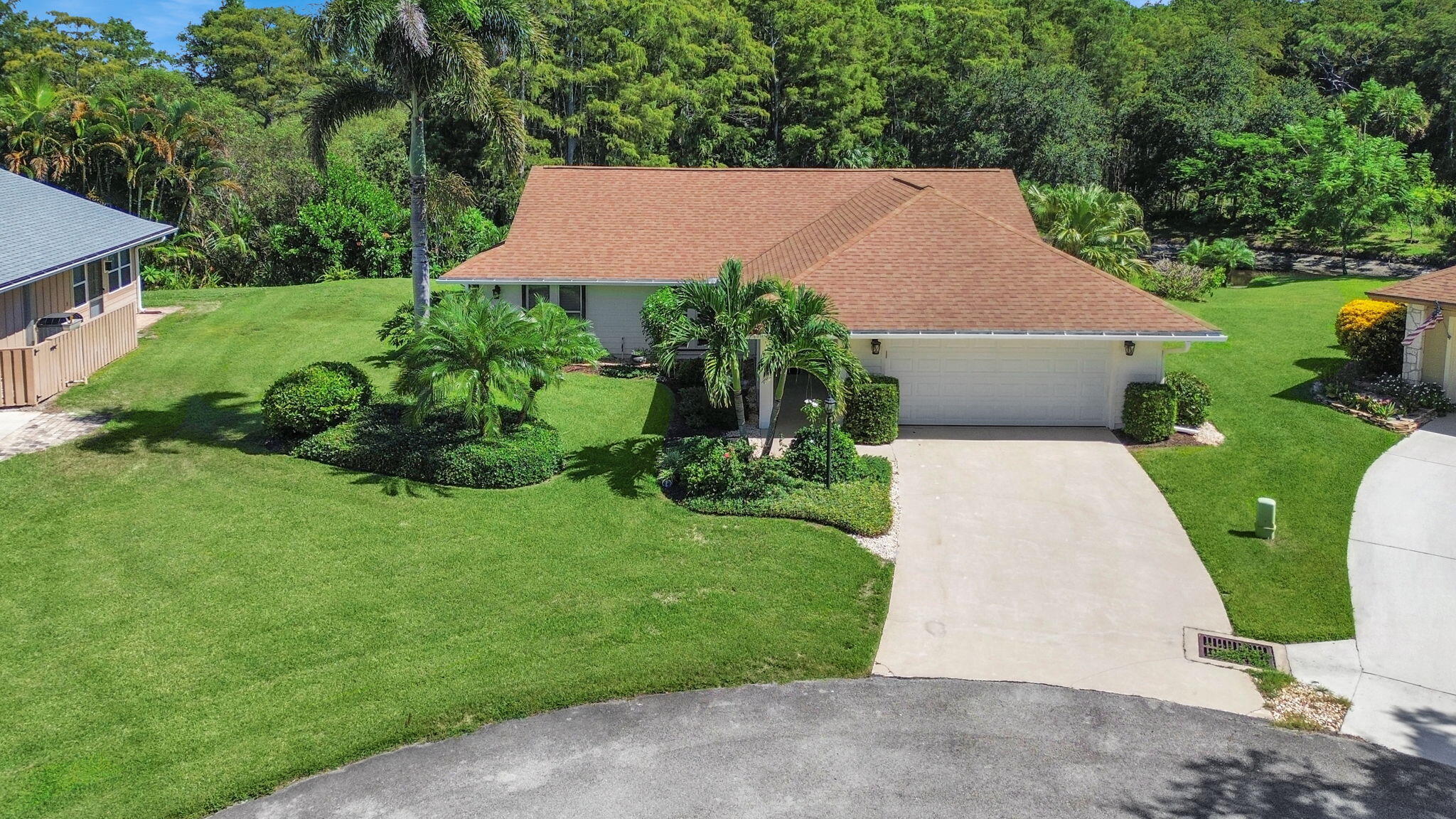 8165 Southeast Cypress Point Place Hobe Sound, FL 33455 - Photo 32 of 46 an aerial view of a house