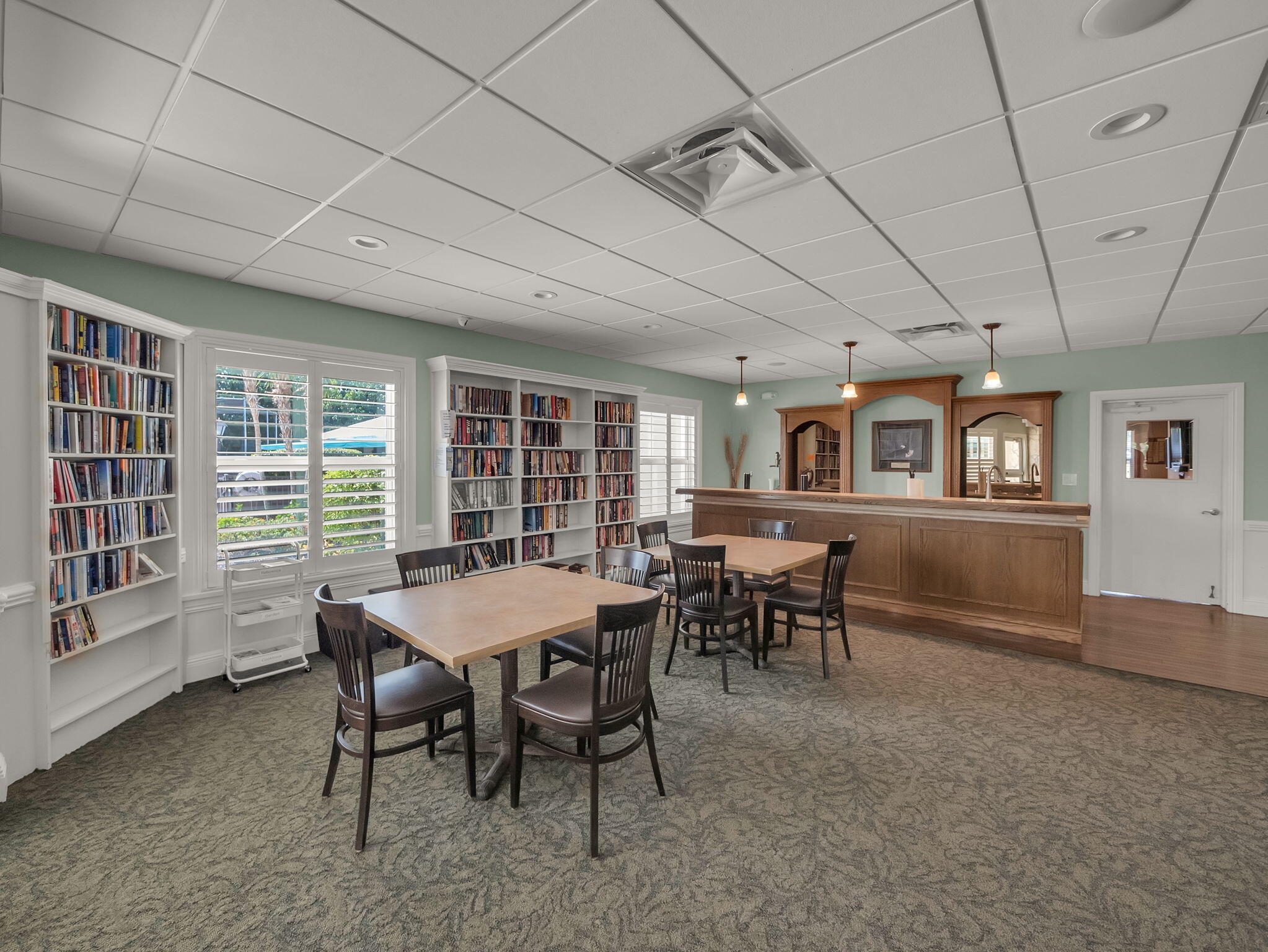 8165 Southeast Cypress Point Place Hobe Sound, FL 33455 - Photo 43 of 46 a view of a dining room with furniture window and wooden floor