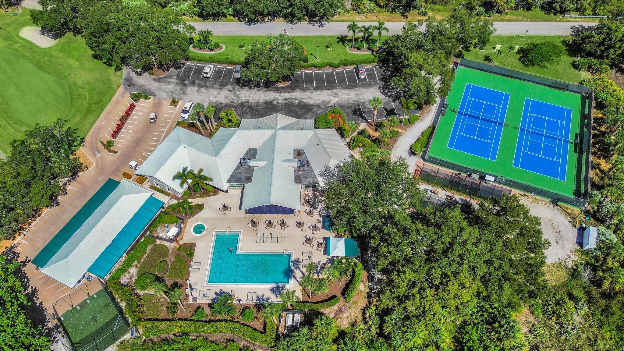 8165 Southeast Cypress Point Place Hobe Sound, FL 33455 - Photo 44 of 46 an aerial view of a house with a yard and outdoor space