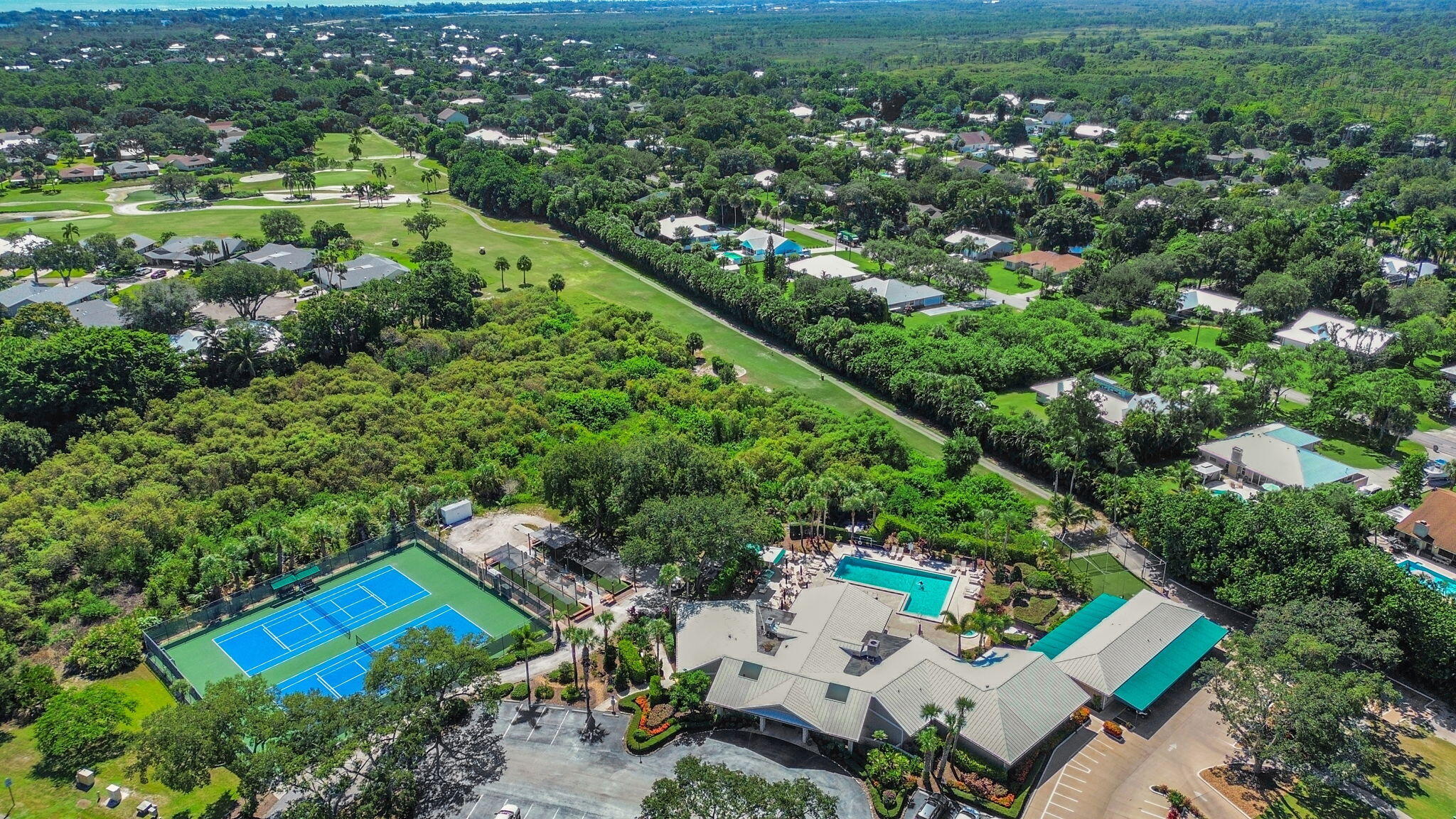 8165 Southeast Cypress Point Place Hobe Sound, FL 33455 - Photo 45 of 46 an aerial view of a house with a yard