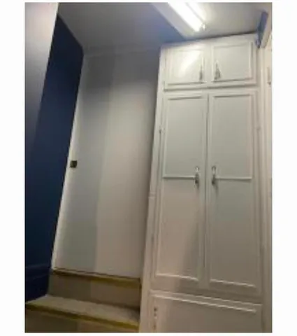 a bathroom with a sink toilet and mirror