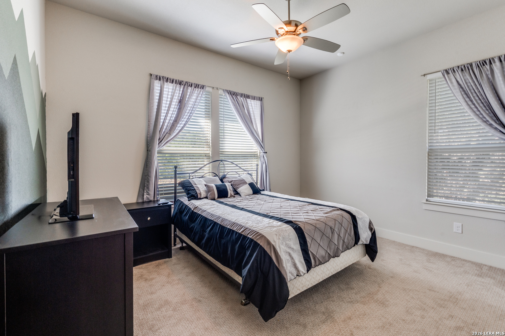 230 Sabella Spring Branch, TX 78070 - Photo 14 of 24 a bedroom with a bed window and a flat screen tv