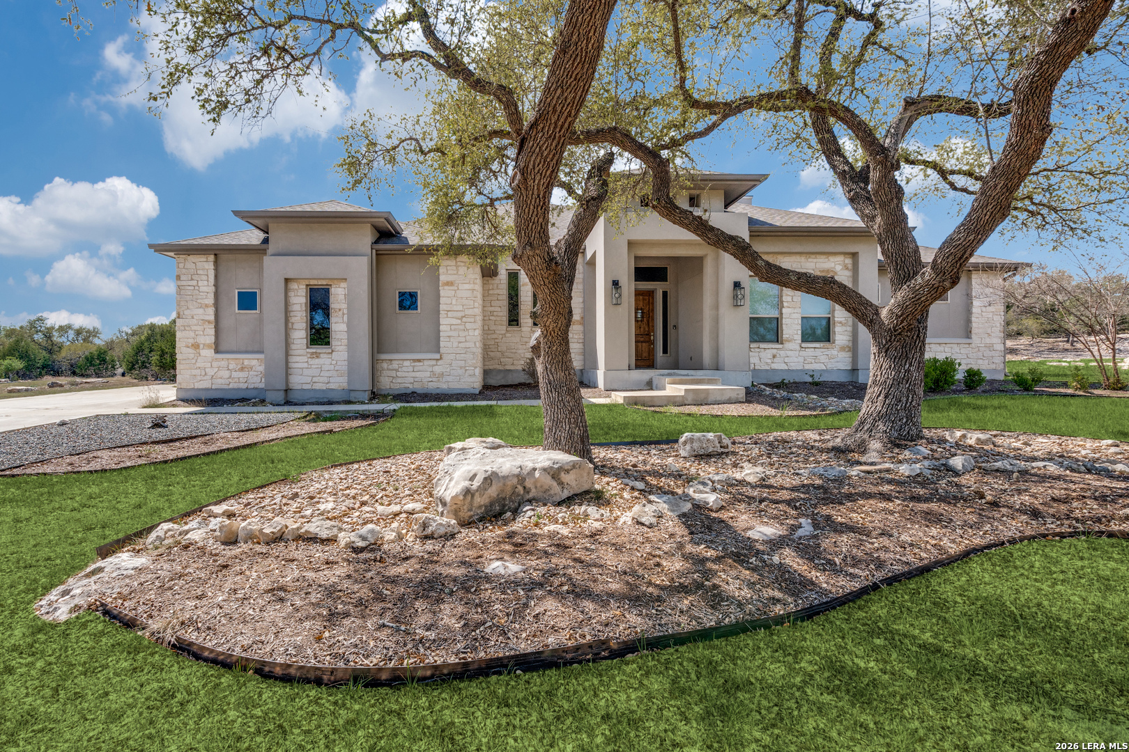 230 Sabella Spring Branch, TX 78070 - Photo 2 of 24 a front view of a house with garden