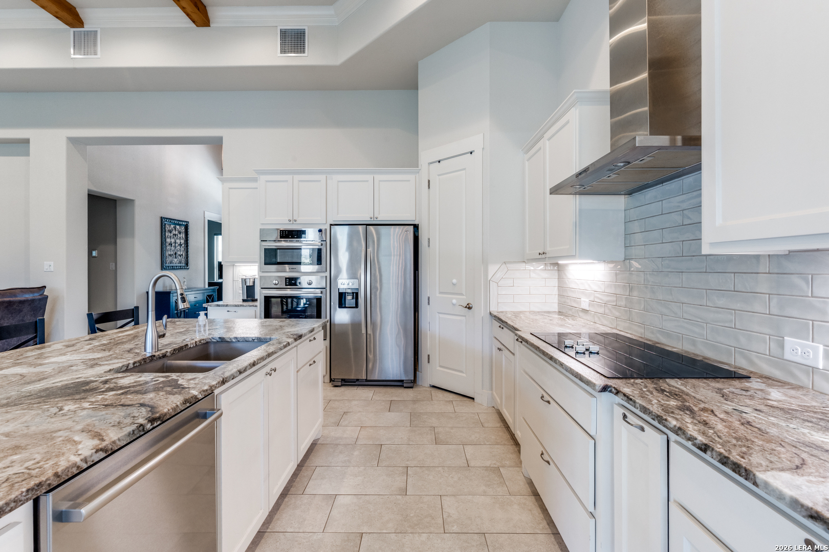 230 Sabella Spring Branch, TX 78070 - Photo 7 of 24 a kitchen with stainless steel appliances granite countertop a sink stove and refrigerator