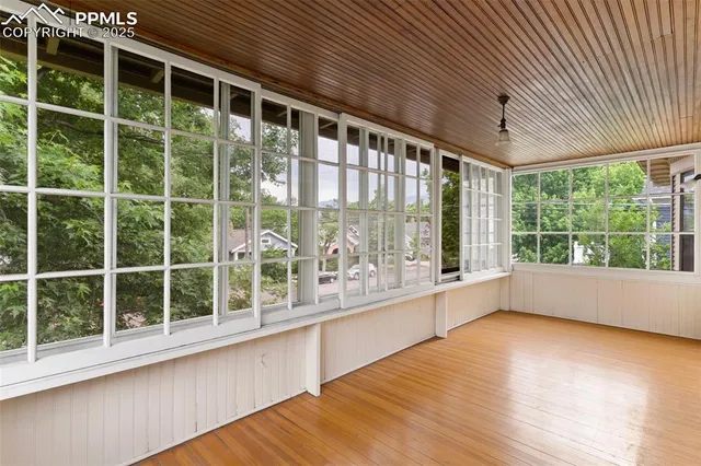 a view of backyard with sitting area