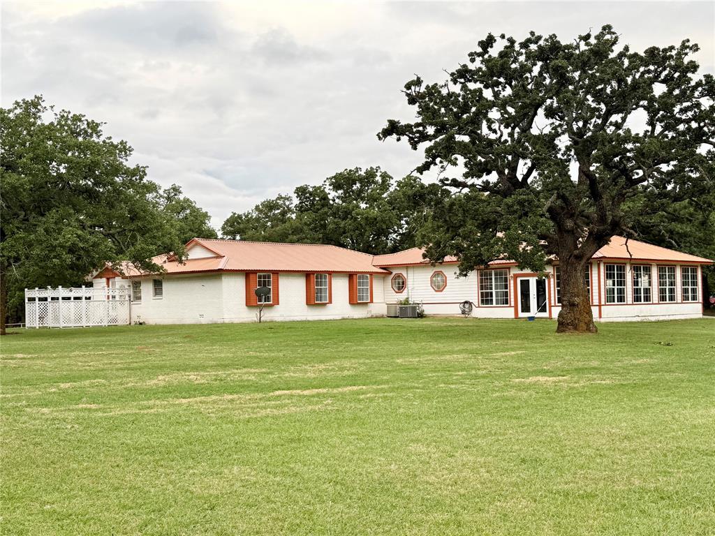 4216 Greenwood Road Weatherford, TX 76088 - Photo 24 of 26 Back of home. Terraced area offers private patio.