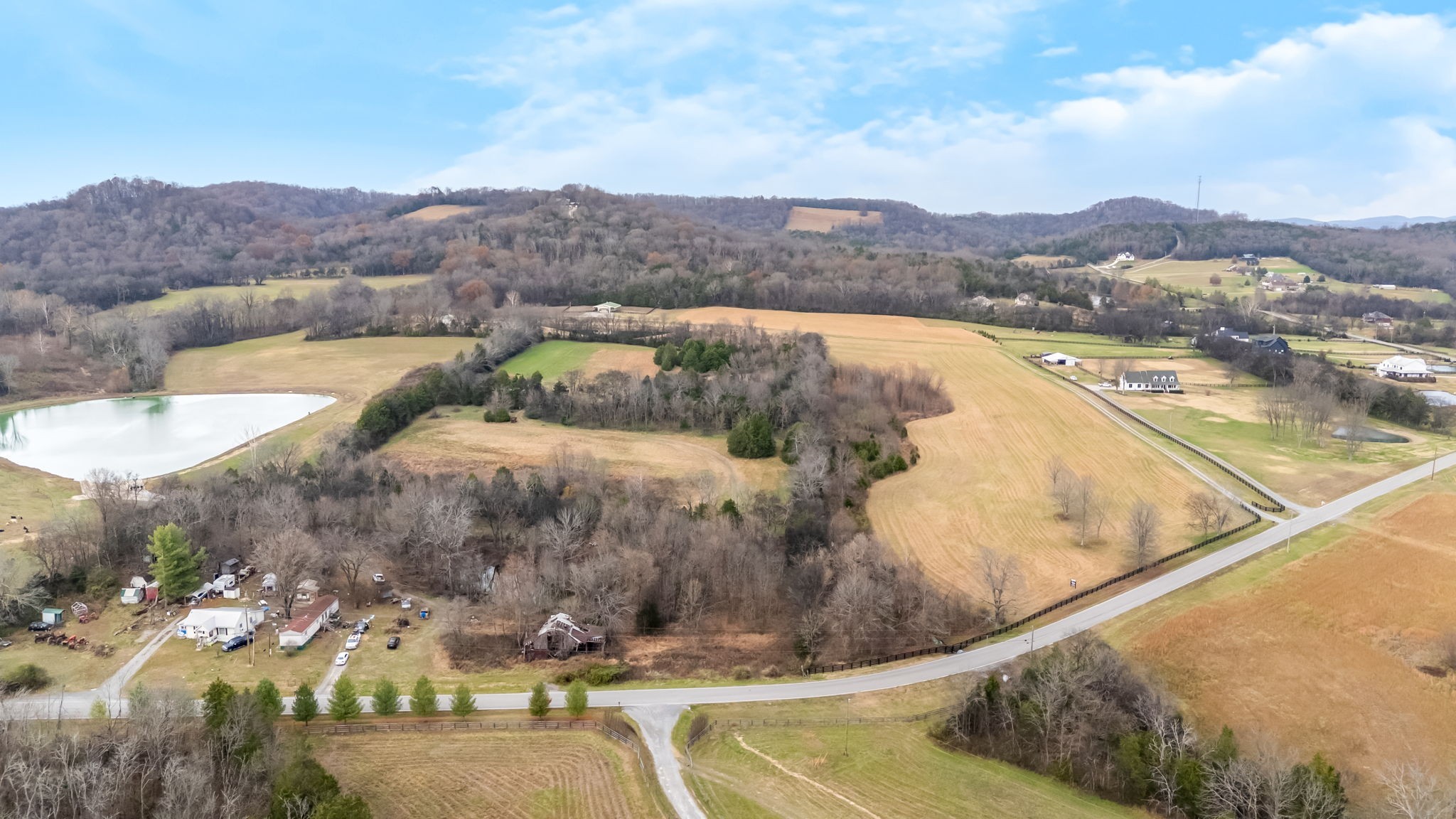 3100 Floyd Road Eagleville, TN 37060 - Photo 59 of 62 a view of a swimming pool with a lake