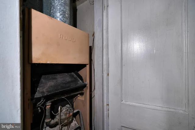 a view of a car parked in front of a building