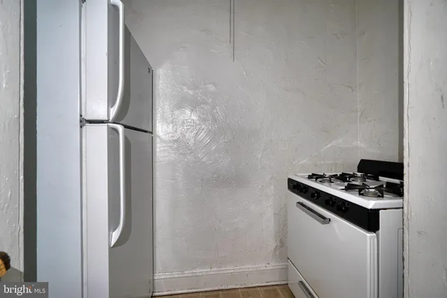 a bathroom with a sink and a shower