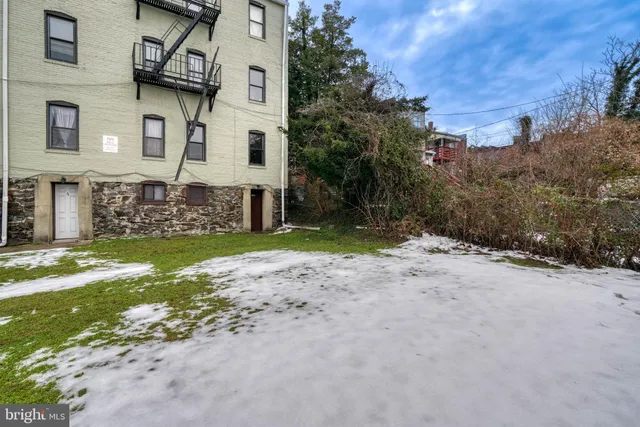 a bathroom with a sink a toilet and a bathtub